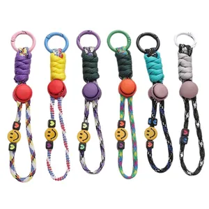 Set of six colorful paracord keychains with smiley face and heart beads for bag charms
