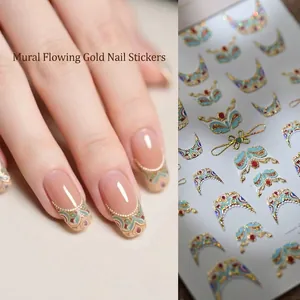 Dunhuang style 3D embossed nail stickers with gold mural patterns shown on hands and sheet