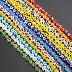 Macro view of colorful flat flower Millefiori glass beads for jewelry DIY