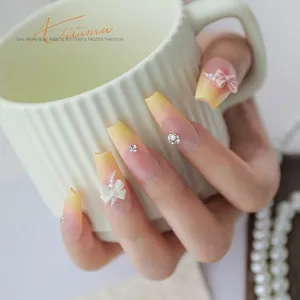 Creamy resin bow-knot nail art accessories with pearls and rhinestones on gradient nails