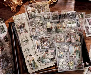 Detailed view of vintage PET transfer stickers with elegant floral and lady illustrations