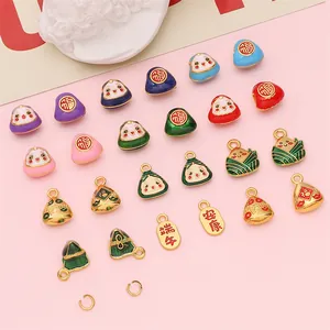 Close-up of colorful alloy enamel Zongzi charms and beads for DIY jewelry making