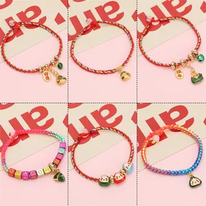 Various styles of Dragon Boat Festival woven bracelets featuring Zongzi charms and letter beads