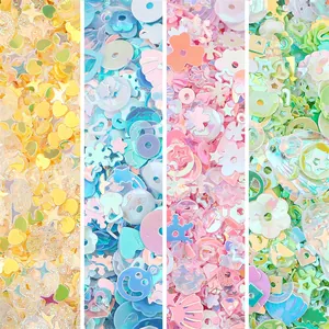 Detailed view of colorful iridescent sequins in heart flower and shell shapes for DIY