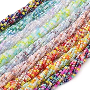 Close-up of 2mm colorful faceted square glass beads for DIY jewelry making