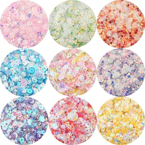 Detail view of colorful DIY sequins in various shapes like stars and hearts