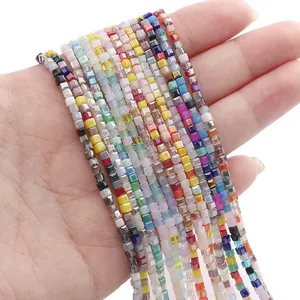 Close-up view of 2mm colorful faceted square glass beads for handmade DIY jewelry making