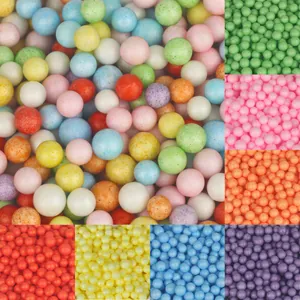 Macro detail of vibrant multicolored foam beads for DIY crafts and gift box stuffing