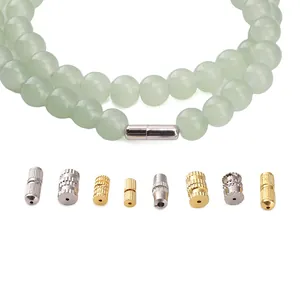 Detailed view of various metal screw clasps for DIY jewelry making and necklaces