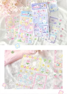 Macro view of pixel art PET stickers with cute floral frame designs for journaling