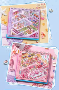 Detailed view of two micro-landscape sticker book pages featuring cake and ice cream shops.