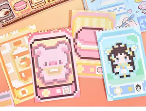 Detail view of colorful pixel art sticker sheets with cute animal and character designs