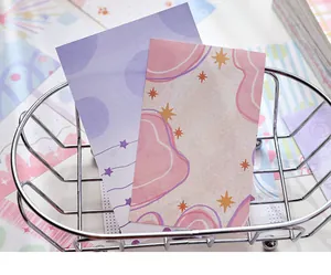 Close-up of pastel colored A7 decorative background paper bricks for scrapbooking memo