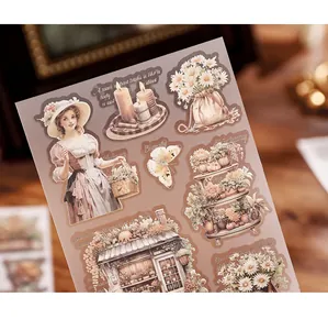 Detailed macro view of vintage PET transfer stickers for scrapbooking and decoration