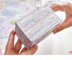 Detailed view of the colorful M5 paper brick showing the thick stack of sheets