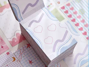 Close-up of colorful non-adhesive A7 paper block with heart and wave patterns