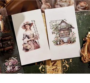Detailed view of vintage PET transfer stickers with Victorian lady and floral designs