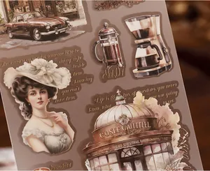 Close-up of vintage PET transfer stickers with classical motifs for scrapbooking