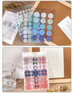 Detail of translucent PET dot stickers in various sizes for journaling and scrapbooking.