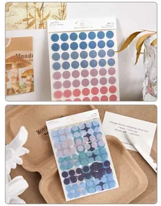 Close-up view of translucent PET dot stickers in various colors for scrapbooking