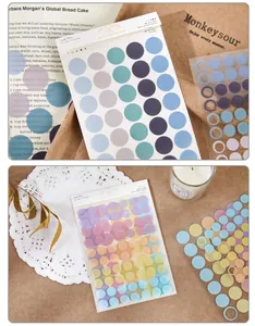 Detail showing multi-colored PET circular stickers for creative DIY scrapbooking