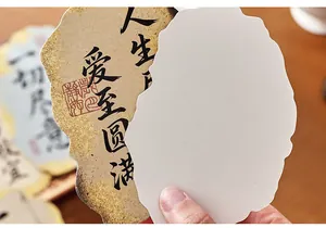 Detailed view of artistic vintage-style postcards featuring Chinese calligraphy and paper texture