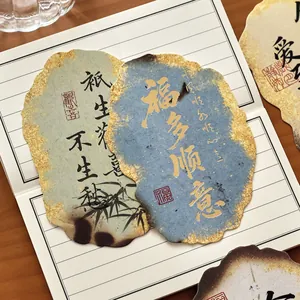 Vintage Chinese calligraphy postcards with artistic burnt edges and gold foil detailing