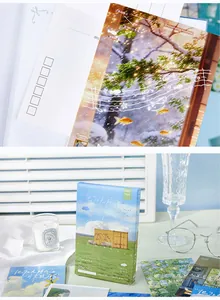 Aesthetic artistic landscape postcards and souvenir cards set in a cozy lifestyle scene