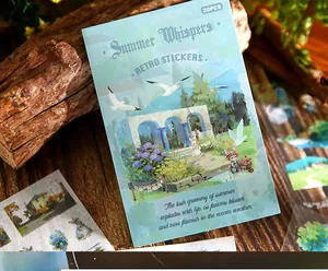 Close-up of Summer Whispers retro sticker book with pastoral garden illustration