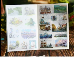 Detailed view of vintage landscape stickers for DIY scrapbooking and journal decoration