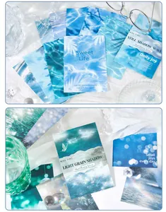 Vue détaillée du papier de scrapbooking Cloud Chasing Waves aux motifs d'eau bleue.