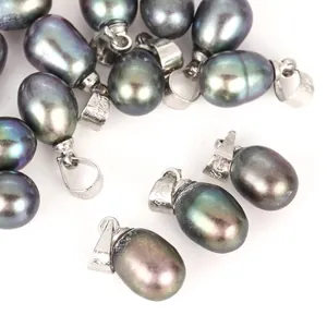 Detail of black iridescent rice-shaped pearl pendants with S925 silver bails