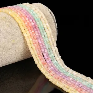 Close-up detail of 3mm multi-colored shell disc beads strands for DIY jewelry making
