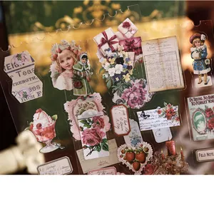Close-up of vintage European style transparent sticker sheet with floral and portrait motifs