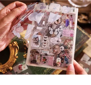 Close-up view of vintage European style sticker book for DIY scrapbooking, 50 sheets set