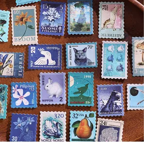 Assorted vintage-style stamp stickers featuring floral, animal, and landscape motifs