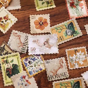 Set of vintage-style postage stamp stickers with floral and animal art for DIY.