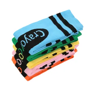 Close-up detail of colorful Crayola striped over-the-knee socks for costume party