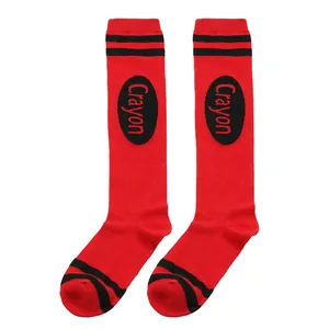 Detail view of red crayon knee high socks with black stripes and printed text.