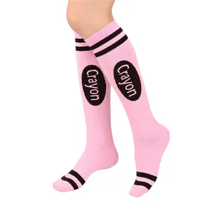 Detailed view of pink Crayon knee-high socks with double black stripes for cosplay