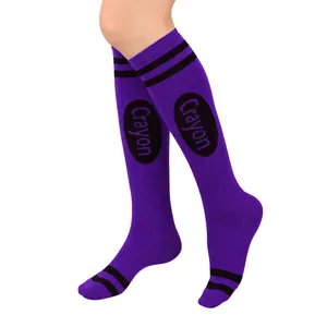 Close-up of purple crayon-themed knee-high socks with black stripes for Halloween costumes