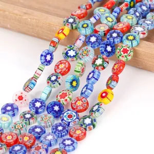 Detailed view of colorful 10mm flat round millefiori floral glass beads for DIY jewelry making