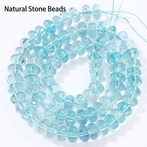 Detailed view of translucent light blue 5x8mm crystal rondelle beads for jewelry making