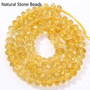 Macro view of 8mm yellow faceted burst pattern crystal beads for DIY jewelry making