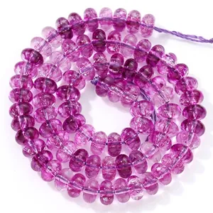 Detailed close-up view of 5x8mm purple crystal abacus beads for DIY jewelry making accessories