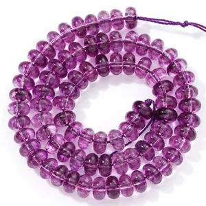 High quality macro view of 5x8mm purple abacus crystal beads for DIY jewelry making