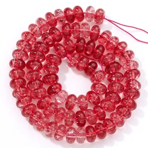 Macro view of 5x8mm red translucent crystal abacus beads for DIY necklace making