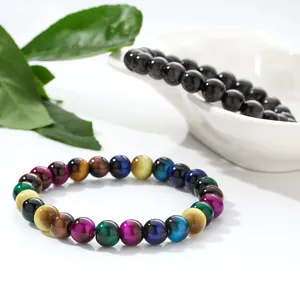 Close-up of colorful and black tiger eye glass bead bracelets for unisex DIY jewelry