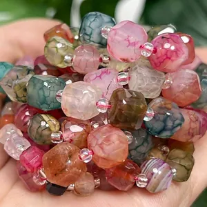 Close-up of colorful faceted dragon-vein sugar cube beads for DIY jewelry making