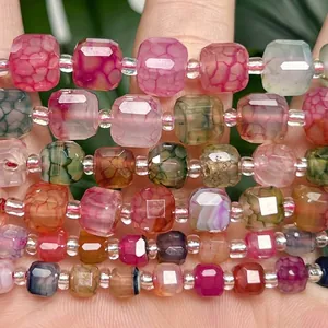 Macro view of colorful dragon vein agate cube beads with faceted texture